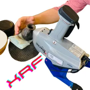 Photo of handheld XRF scanner